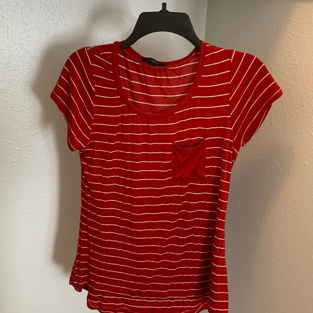 It is a very cute shirt but is somewhat see-through.